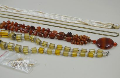 null Lot of costume jewelry including necklaces and necklaces, and a pair of ear...