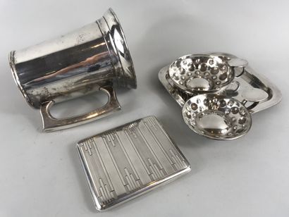 null Silvered metal lot composed of a mug with glass bottom, a coaster CHANEL, a...