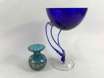 null Large cup on twisted pedestal in translucent and midnight blue Venetian glass.

Circular...