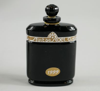 null CARON " Nuit de Noël " Christmas 1999 Edition.

Black opaque crystal bottle,...