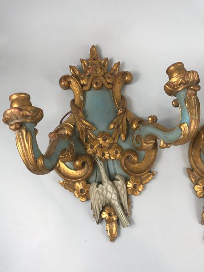 null Pair of sconces with two arms of light in carved, lacquered and gilded wood...