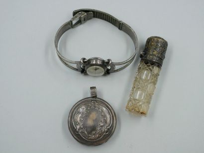 null Silver-plated metal lot including an antique rattle, a watch and an antique...