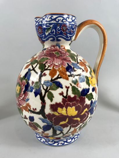 null GIEN, late 20th century

Earthenware jug with peony decoration

Marked under...