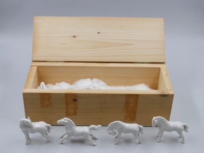 null Lot including: 

- CHINA. Series of eight horses of Happiness in white porcelain...