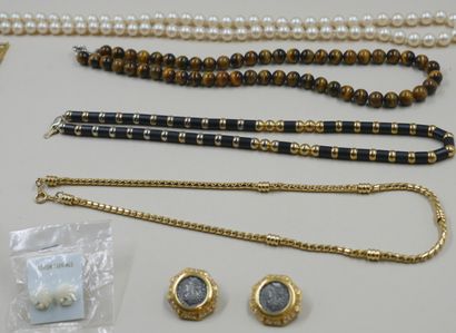 null Lot of costume jewelry including necklaces, a pair of ear studs and a pair of...