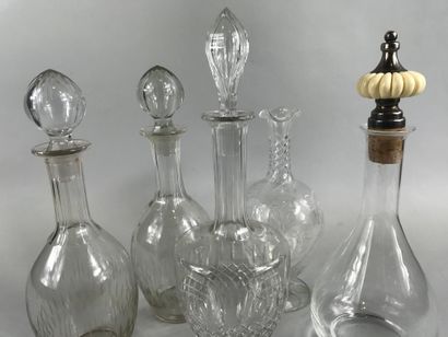 null Set of five carafes in cut glass, one of which has a godronné stopper in re...