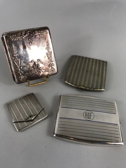 null 
Lot including: 




- a silver cigarette case, blue enameled nets and figured...