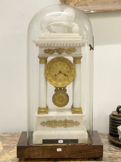 null Portico clock in white marble and gilt bronze decorated with scrolls and palmettes,...