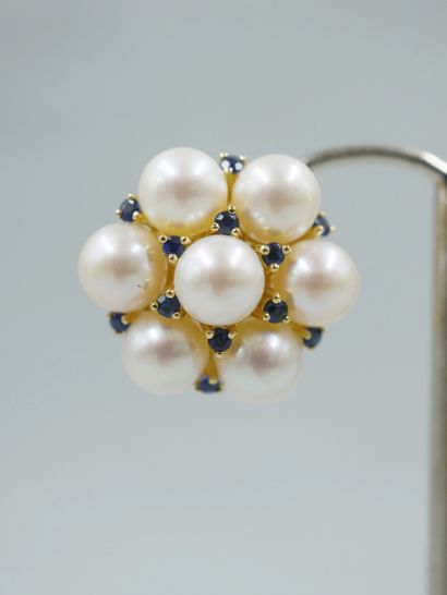null Pair of 18k yellow gold flower earrings set with cultured pearls and sapphires....