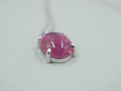 null Pendant in 18k white gold set with a pink tourmaline cabochon of 4cts, the hoop...