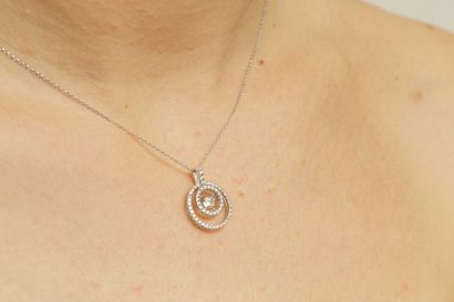 null Pendentif Cercle en or blanc 18k avec diamant dansant en son centre de 0,40cts...