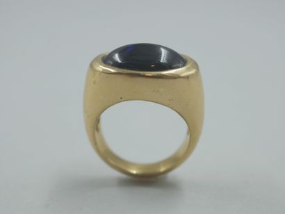 null 
Important 18k yellow gold dome ring set with a cabochon of oval sapphire weighing...