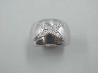 null 
MAUBOUSSIN.

Dome ring in 18k white gold decorated with the Divine Star.

PB...