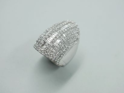 null 18k white gold dome ring set with lines of brilliant-cut diamonds interspersed...