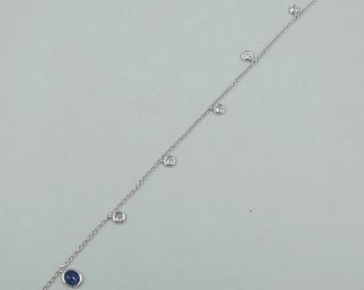 null Pendant bracelet in 18k white gold with four diamonds and an oval sapphire in...
