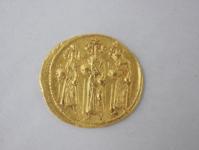 null HERACLIUS and his two sons (632-641). Solidus. Constantinople. Heraclius between...