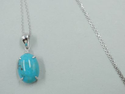 null Pendentif en or blanc 18k retenant une turquoise en cabochon de 4,5cts environ...