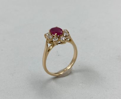 null 18k yellow gold flower ring set with a ruby weighing approximately 0.90ct in...