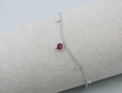 null Pendant bracelet in 18k white gold with four diamonds and an oval ruby in a...
