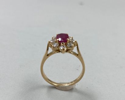 null 18k yellow gold flower ring set with a ruby weighing approximately 0.90ct in...