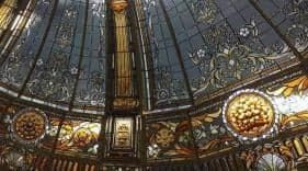 null Stained glass dome decorated at the top with a central medallion with a radiating...