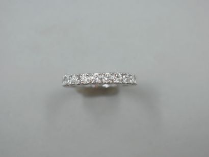 null American wedding band in 18k white gold set with 22 diamonds in F to G color...