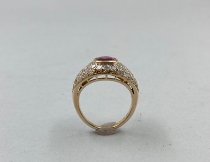null Ring in 18k yellow gold set with a beautiful ruby in a diamond setting.

PB...