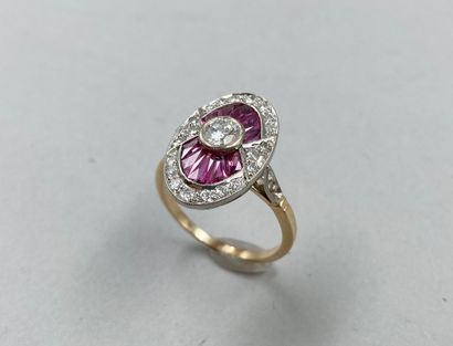 null Marquise ring in two 18k golds, centered on a diamond of 0.35cts in a setting...