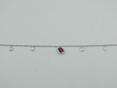 null Pendant bracelet in 18k white gold with four diamonds and an oval ruby in a...
