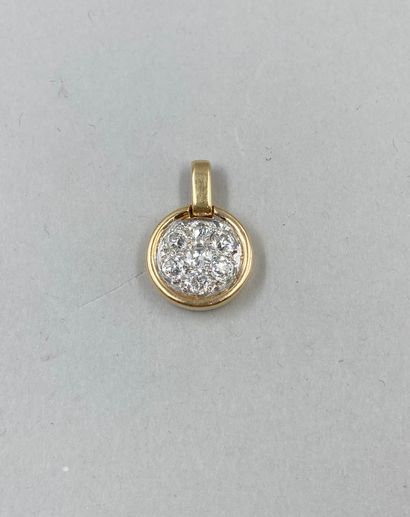 null Circular pendant in 18k yellow gold set with 7 old cut diamonds for 1.10cts...