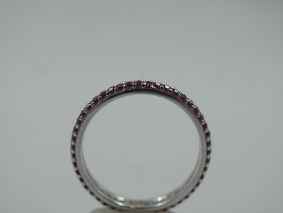 null Ring in 18k white gold with two lines of rubies on the whole ring. 

PB : 2gr....