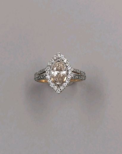 null 14k yellow and white gold Marquise ring set with an openwork design centered...