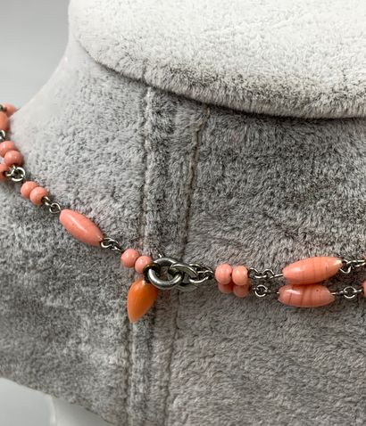 null Coral necklace with angel skin, spindle and round beads, metal spacers. 

Length:...