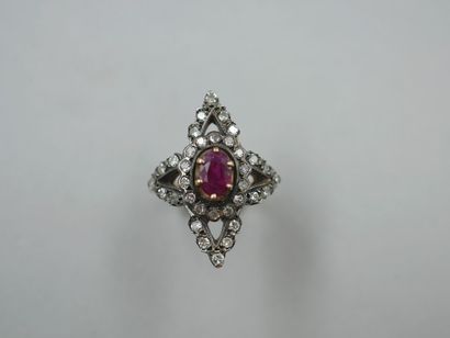 null 18k yellow gold and silver marquise ring centered on a ruby in a star-shaped...