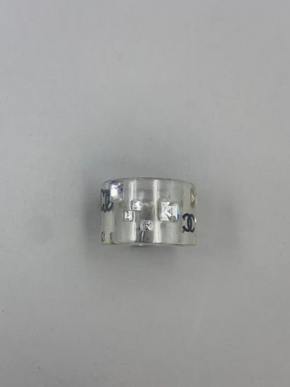 null CHANEL

Transparent plexiglass and rhinestone ring, bears the monogram of the...