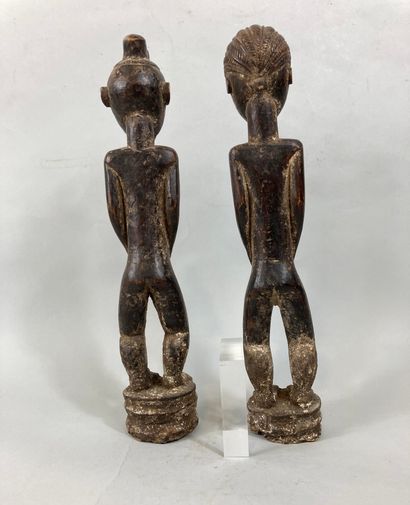 null Couple of Baoule type statuettes, Ivory Coast

Wood with brown patina, pigments

Height...