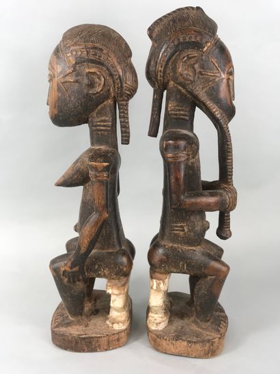 null Couple of Baoule type statues, Ivory Coast

Wood with brown patina, pigments

Height...