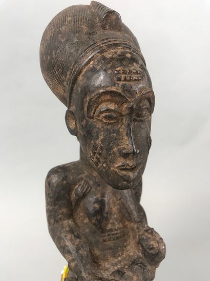null Statuette of a Baoule maternity, Ivory Coast

Wood with brown patina, beads

Height...