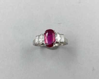 null 18k white gold ring set with a 1.50ct ruby and four marquise and baguette cut...