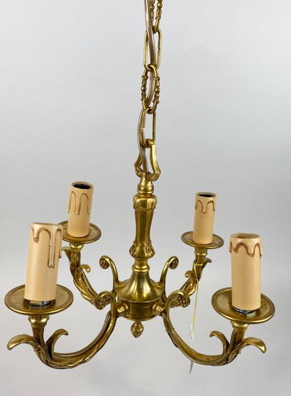 null Two gilded metal chandeliers, one with four arms of light, the other with six...