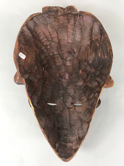 null Mask of the West African type

Wood with brown patina, metal

Height : 39,5...