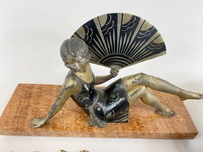null Lot including : 

- Woman with a fan, sculpture in regula. Art Deco period;...