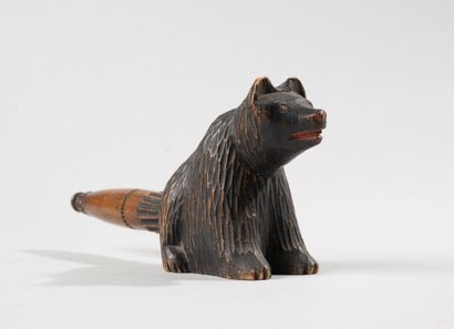 null Nutcracker with screw in carved wood representing a bear. 

Popular work of...