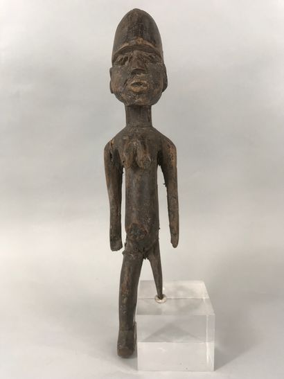 null Ivory Coast type statuette

Wood with black brown patina

Height : 36,5 cm....