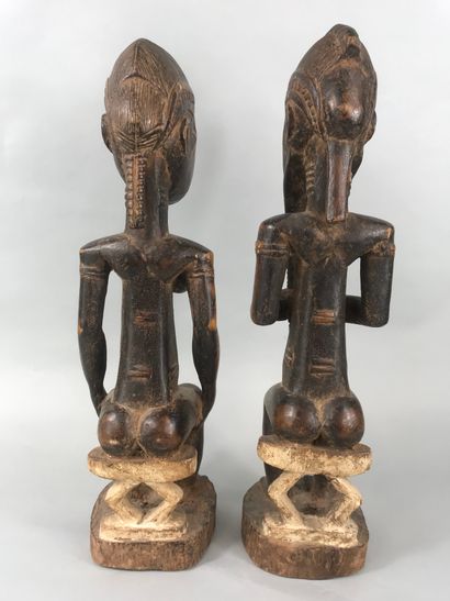 null Couple of Baoule type statues, Ivory Coast

Wood with brown patina, pigments

Height...
