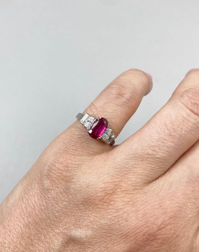 null 18k white gold ring set with a 1.50ct ruby and four marquise and baguette cut...