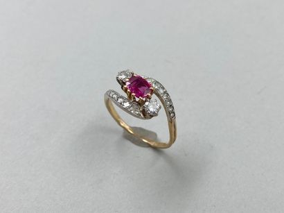 null Ring Vous Moi two 18k golds centered of an oval ruby accosted by two diamonds...