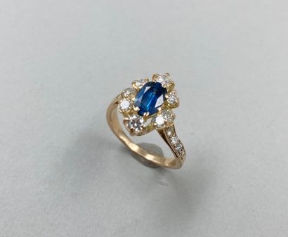 null 18k yellow gold ring centered on an oval sapphire of about 2ct surrounded by...