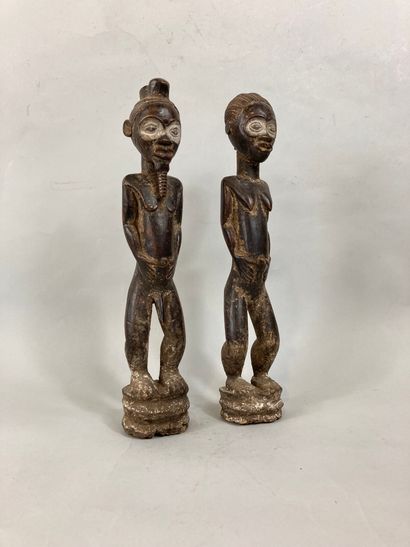 null Couple de statuettes de type Baoule, Côte d’Ivoire

Bois à patine brune, pigments

Haut....