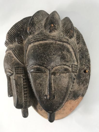 null Baoule type mask, Ivory Coast

Wood with black brown patina

Height Height :...